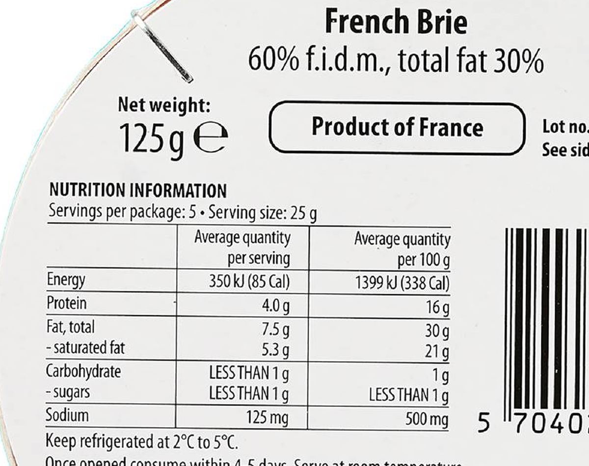 Pack photograph of Mon Ami Double Cream French Brie Petit 125g showing the printed nutrition panel