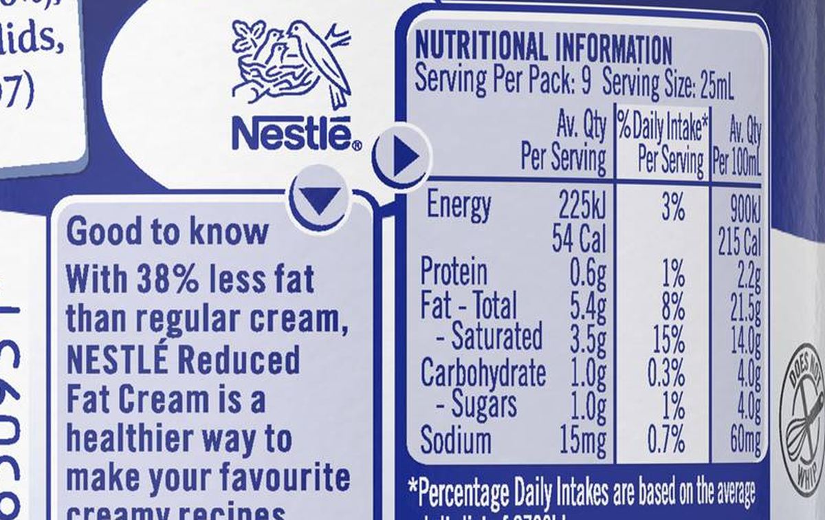Pack photograph of Nestle Reduced Fat UHT Cream 230mL showing the printed nutrition panel