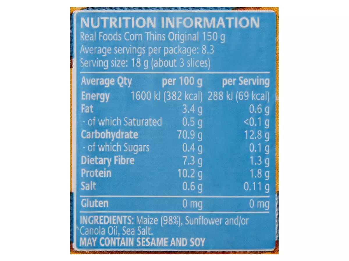 Pack photograph of Real Foods Corn Thins Original 150g showing the printed nutrition panel
