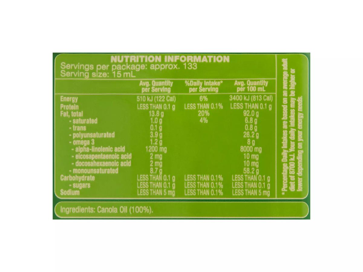 Pack photograph of PURE VITA Canola Oil 2L showing the printed nutrition panel